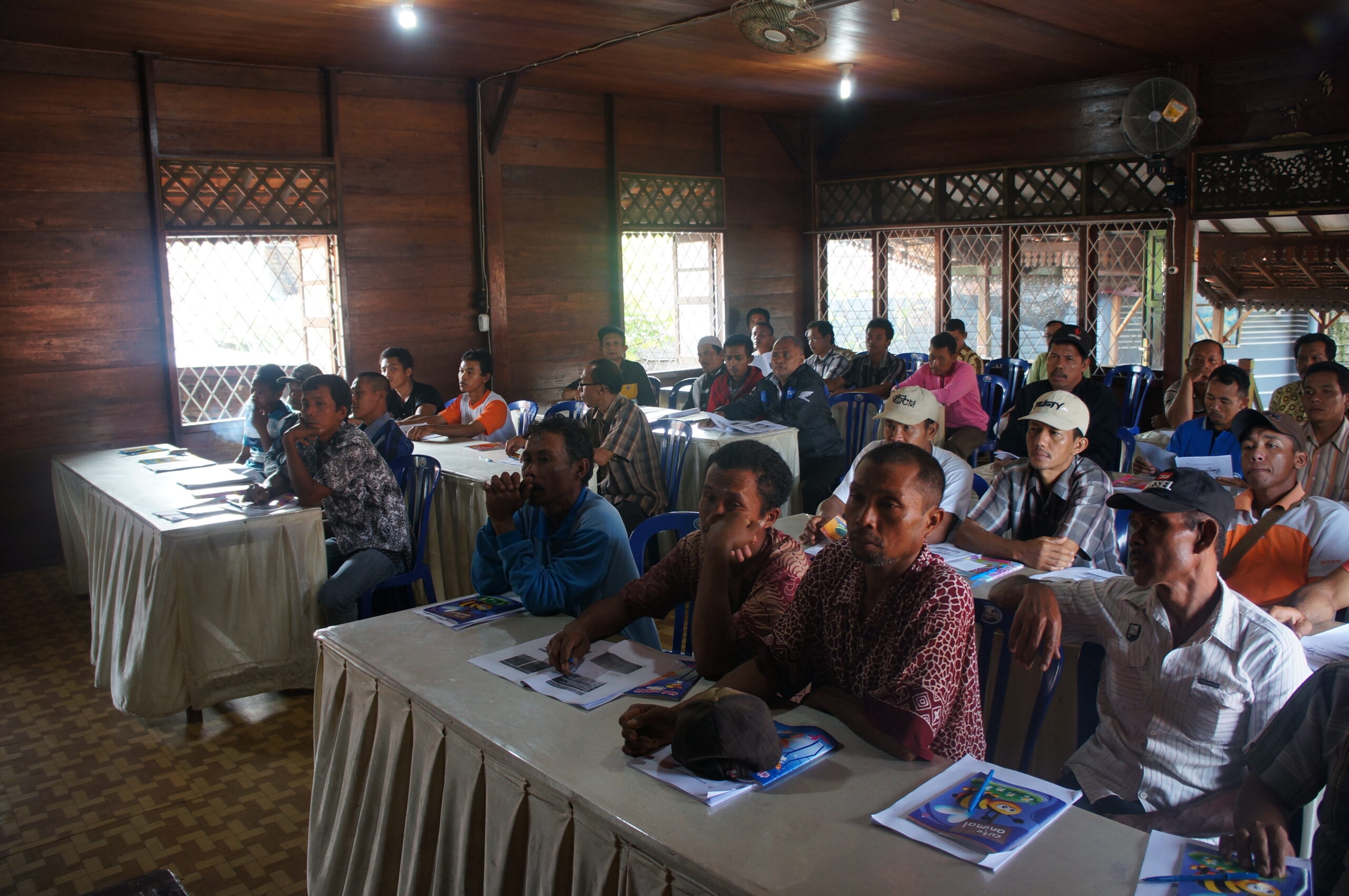 Farmers learning sustainable farming practices in Indonesia